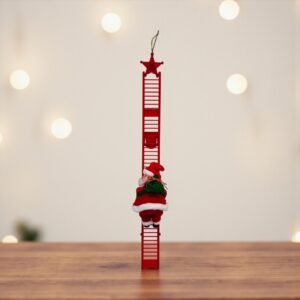 Novogodišnja dekoracija - Deda Mraz koji se penje
